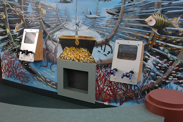 Fun interactive wall with gaming screens to keep children happily engaged before appointments