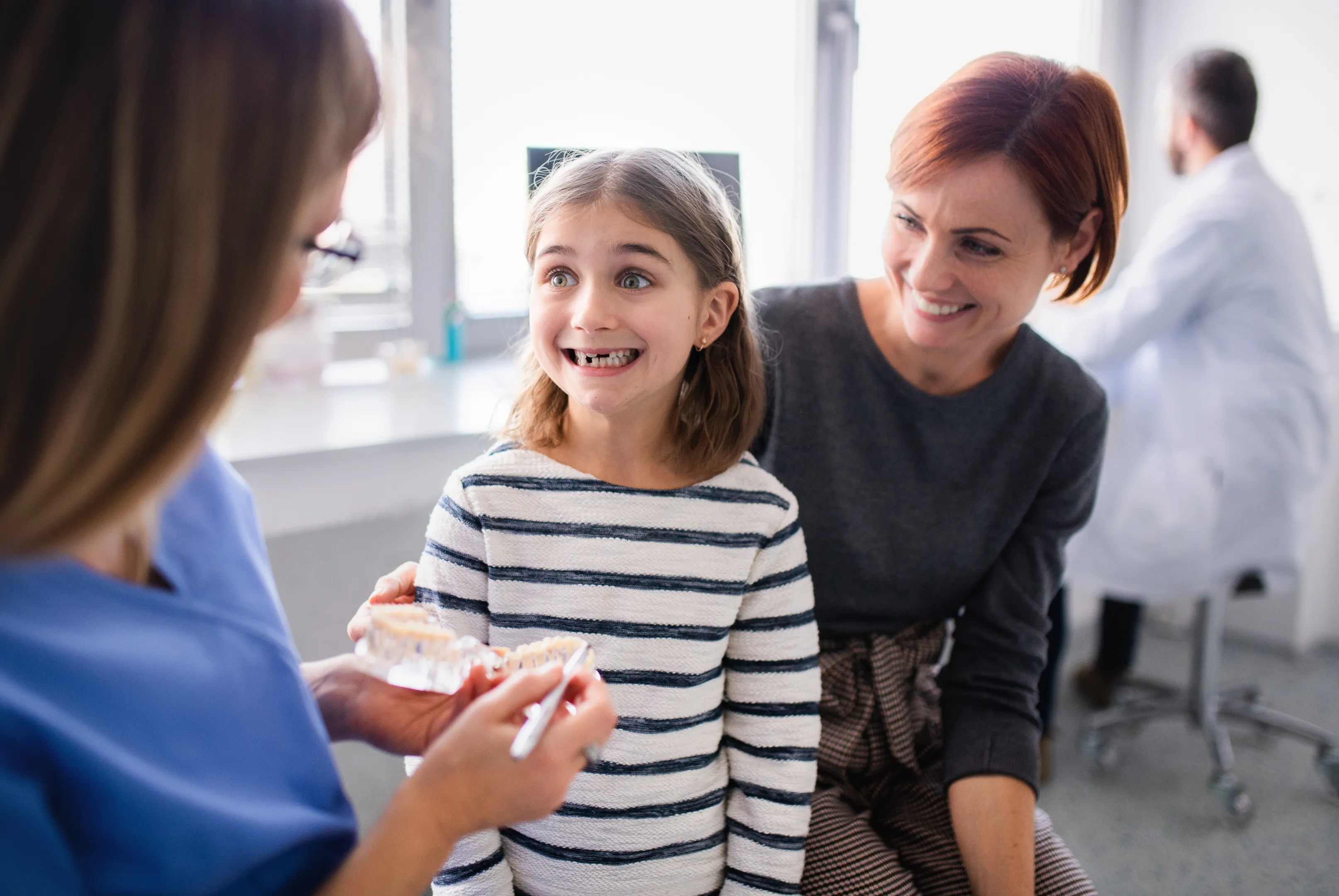 Parent and child discussing patient history
