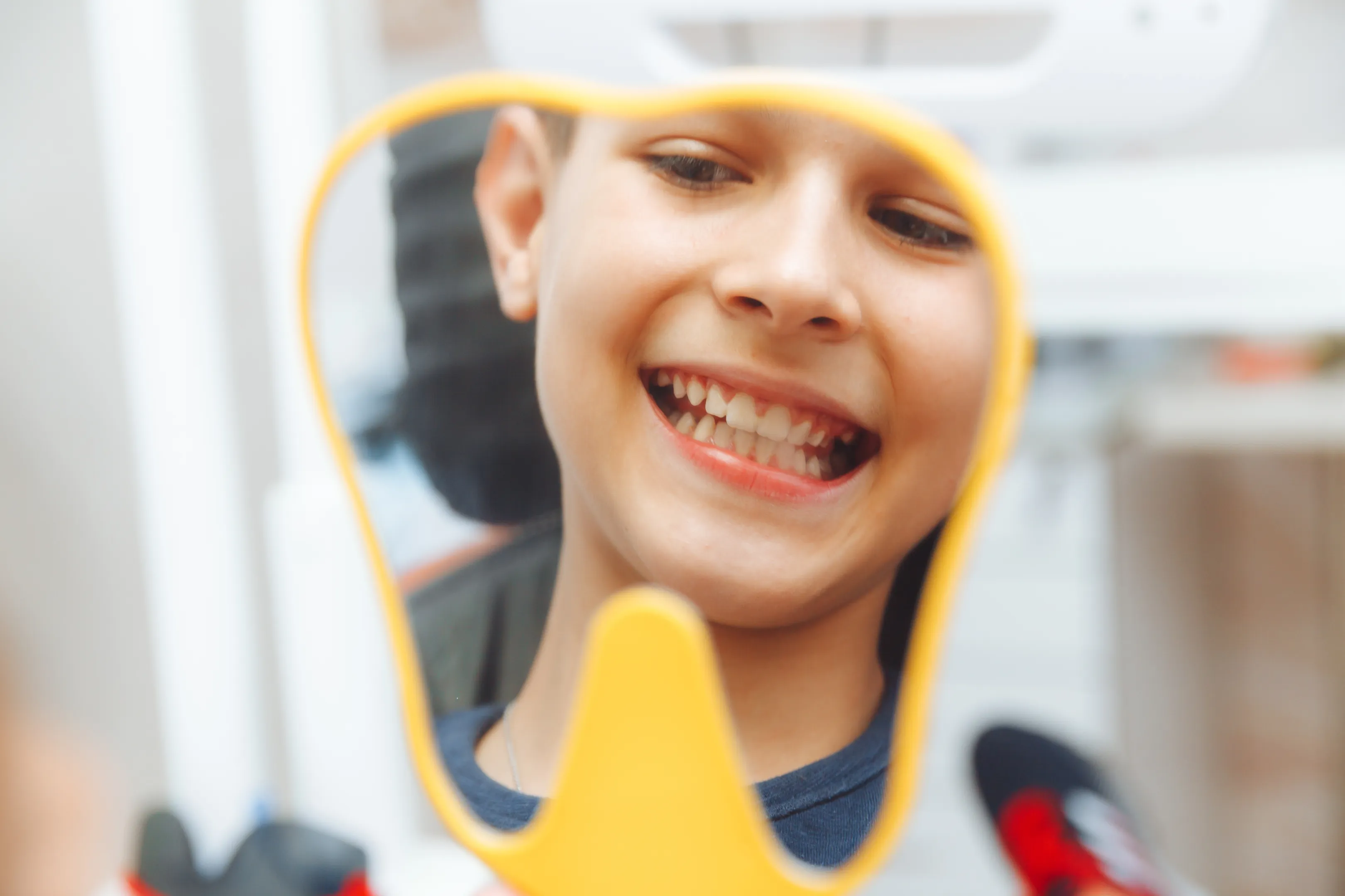 Happy pediatric dental patients smiling