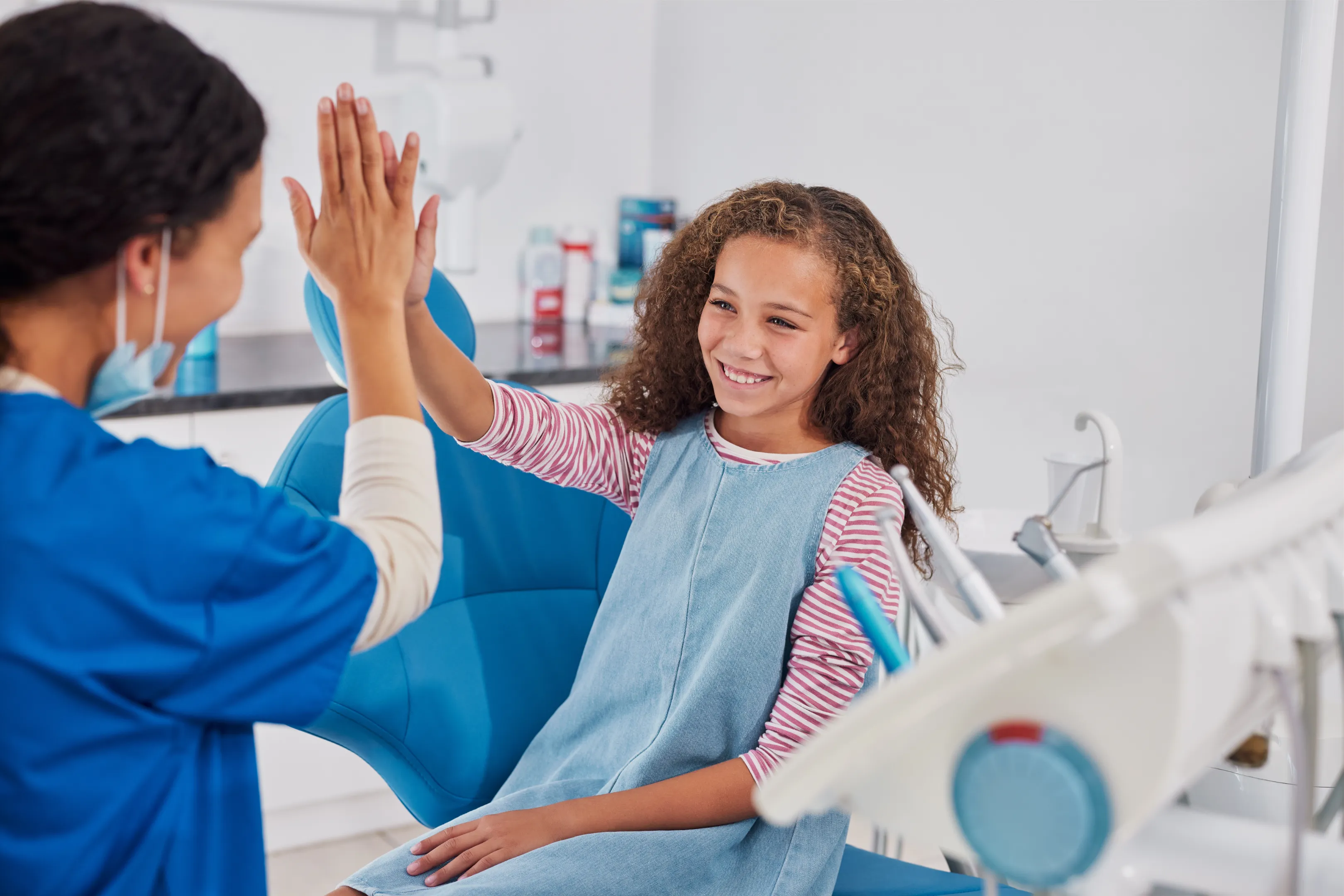 Happy pediatric dental patients smiling