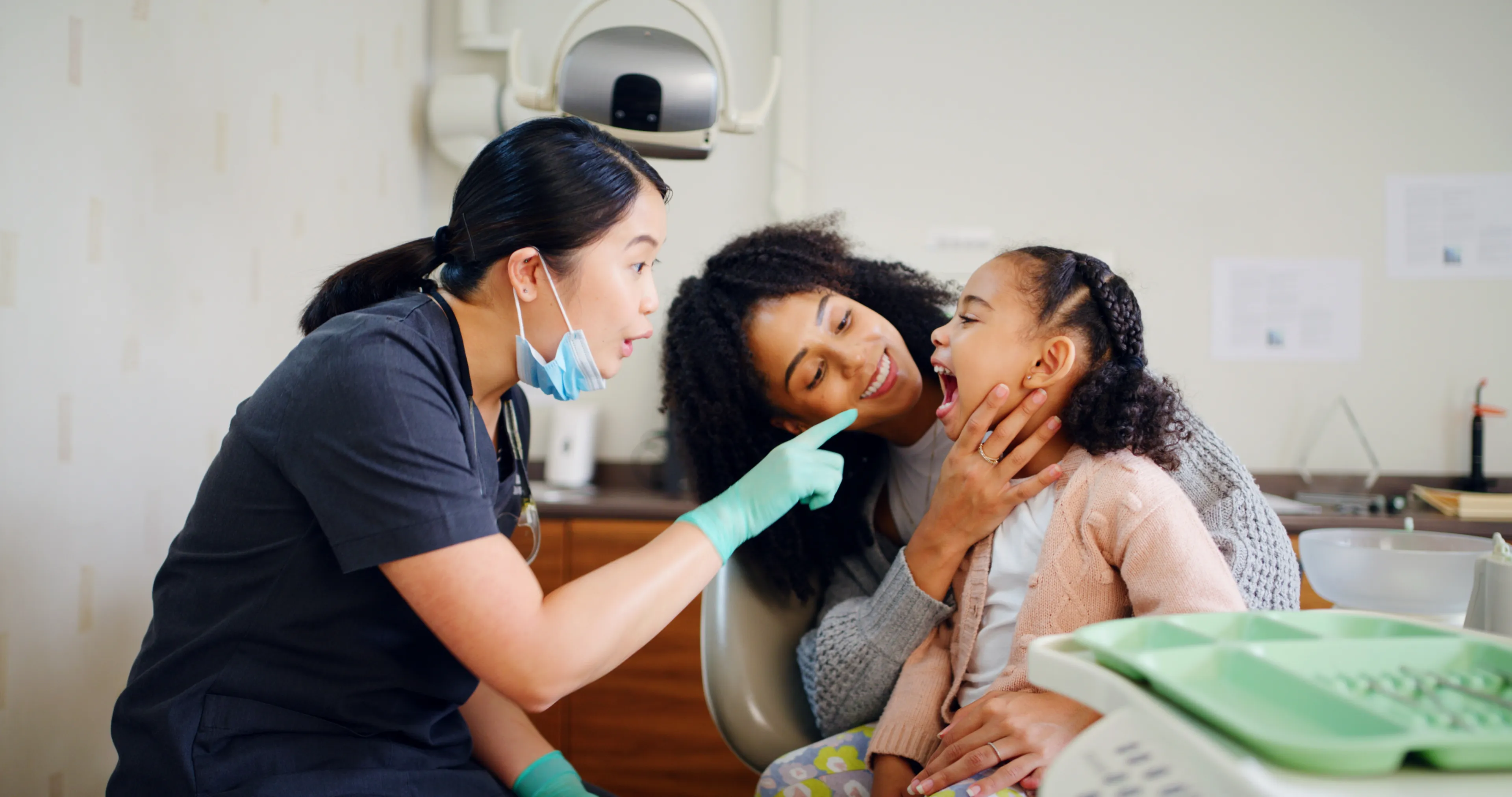 Healthy child smiling at the pediatric dental office
